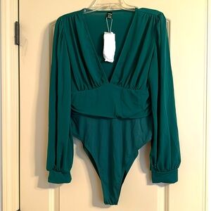 NWT emerald green long sleeve body suit.